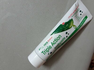 Triple action toothpaste - Product - fr
